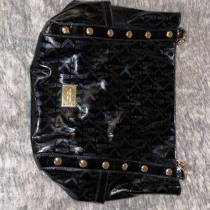 Michael Kors handbag. Large black patent leather. Lots of room.